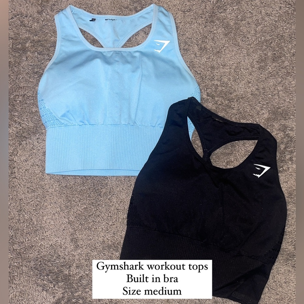 2 Gymshark workout tops. Built in bra. Size medium. One black and one light blue